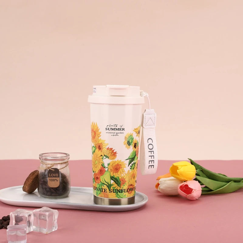 BloomSip Coffee Tumbler with sunflower design, perfect for enjoying hot or cold beverages stylishly.