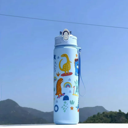 DinoSip Kids Water Bottle with colorful dinosaur designs against a blue sky, perfect for children.