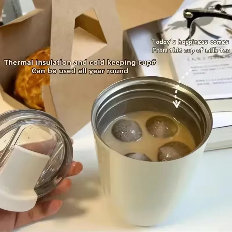 Insulated travel mug with thermal insulation, perfect for keeping drinks cold all year round.