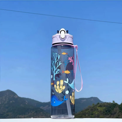 DinoSip Kids Water Bottle featuring colorful ocean designs and a leak-proof lid for fun hydration.