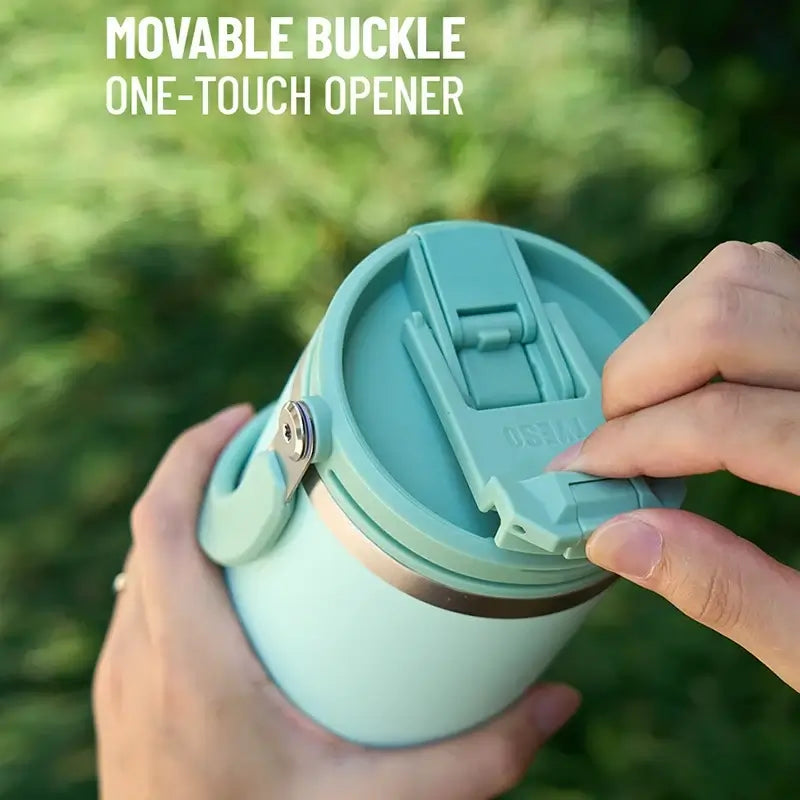 Insulated tumbler with dual-drink lid featuring a movable buckle and one-touch opener for convenient hydration.