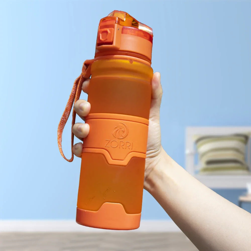 HydroLock Sport Bottle held by a person, showcasing its lightweight and leakproof design for hydration on-the-go.