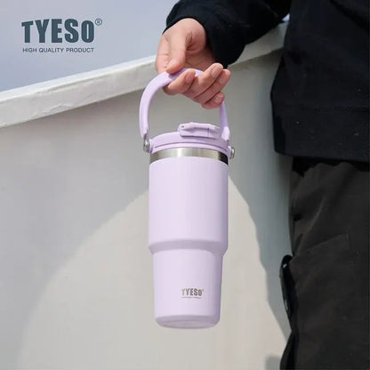 Insulated tumbler with dual-drink lid in pastel purple color, ideal for hydration on the go.