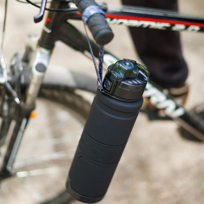 HydroLock Sport Bottle attached to a bike, showcasing its lightweight and durable design for hydration on the go.