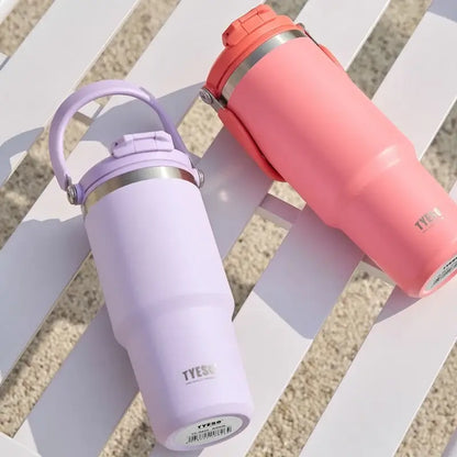 DuoSip Tumbler in lavender and coral, featuring insulated tumbler with dual-drink lid for on-the-go hydration.