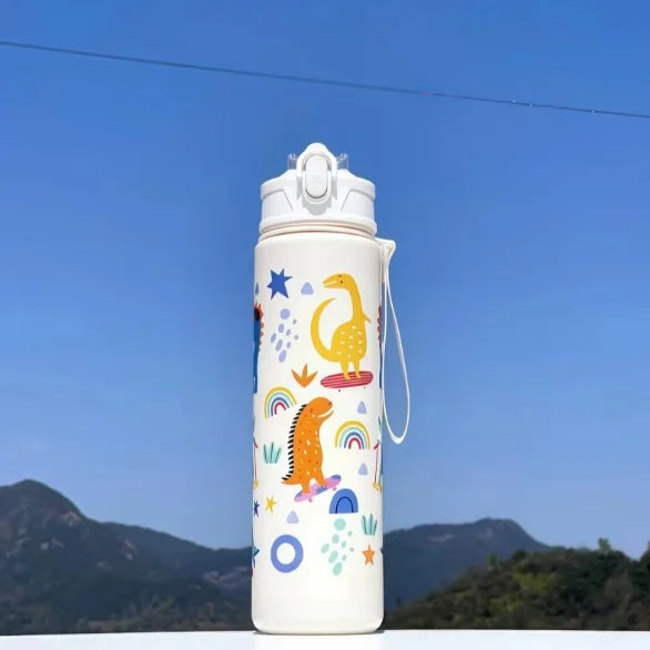 DinoSip Kids Water Bottle with playful dinosaur and rainbow designs against a clear blue sky.