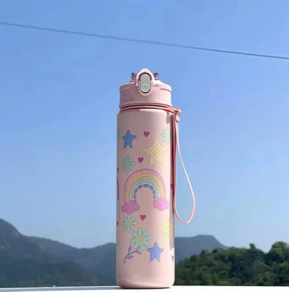 DinoSip Kids Water Bottle in pink with rainbow and star designs, perfect for children's hydration.