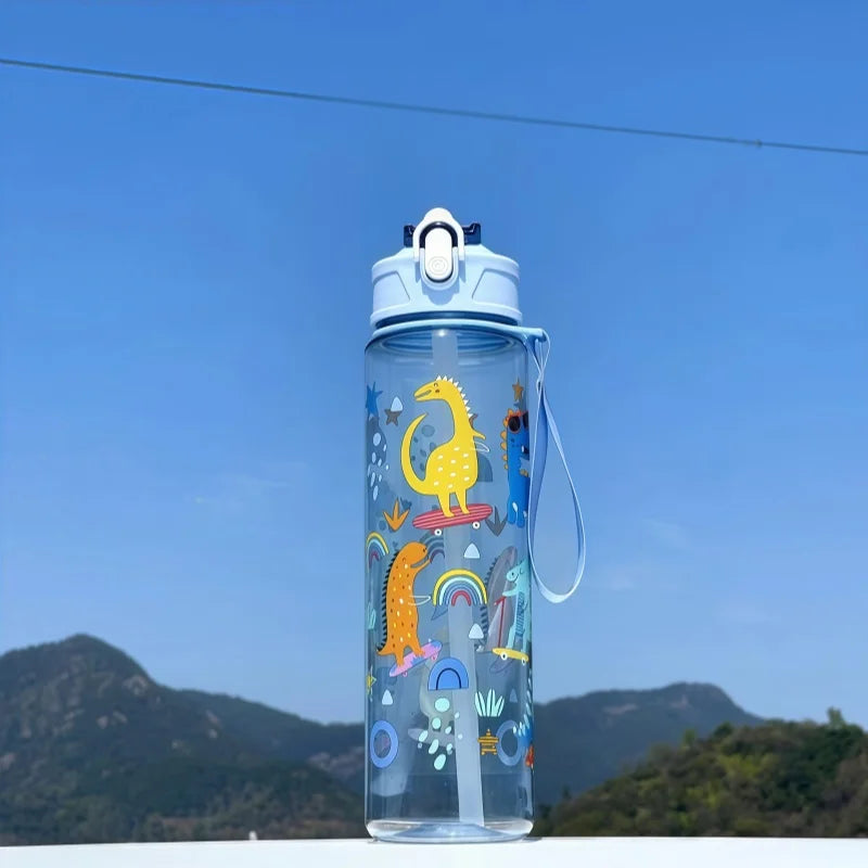 DinoSip Kids Water Bottle featuring colorful dinosaur designs against a blue sky.