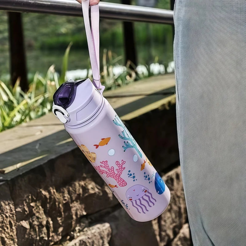 DinoSip Kids Water Bottle with colorful ocean design, ideal for kids' hydration and fun.