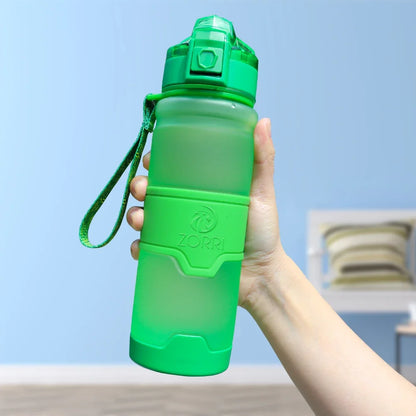 HydroLock Sport Bottle held in hand, showcasing its vibrant green color and ergonomic design for hydration on-the-go.