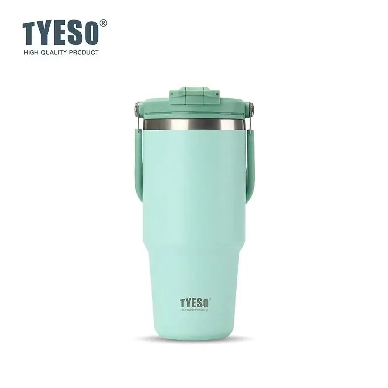 Green insulated tumbler with dual-drink lid for effortless hydration and vacuum insulation.